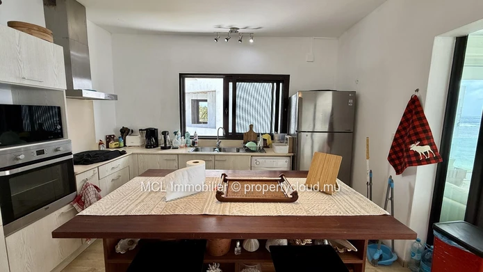 Luxury Beachfront Apartment with Private Pool of the rooftop in Poste Lafayette.